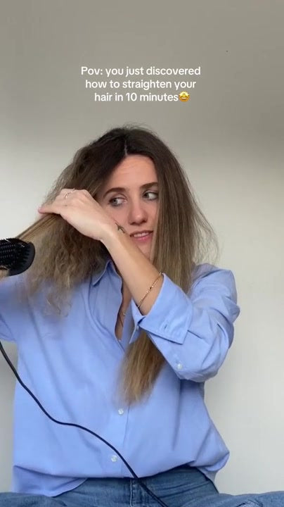 The TNS Straightening Brush working through lengths, doing a flat iron's job