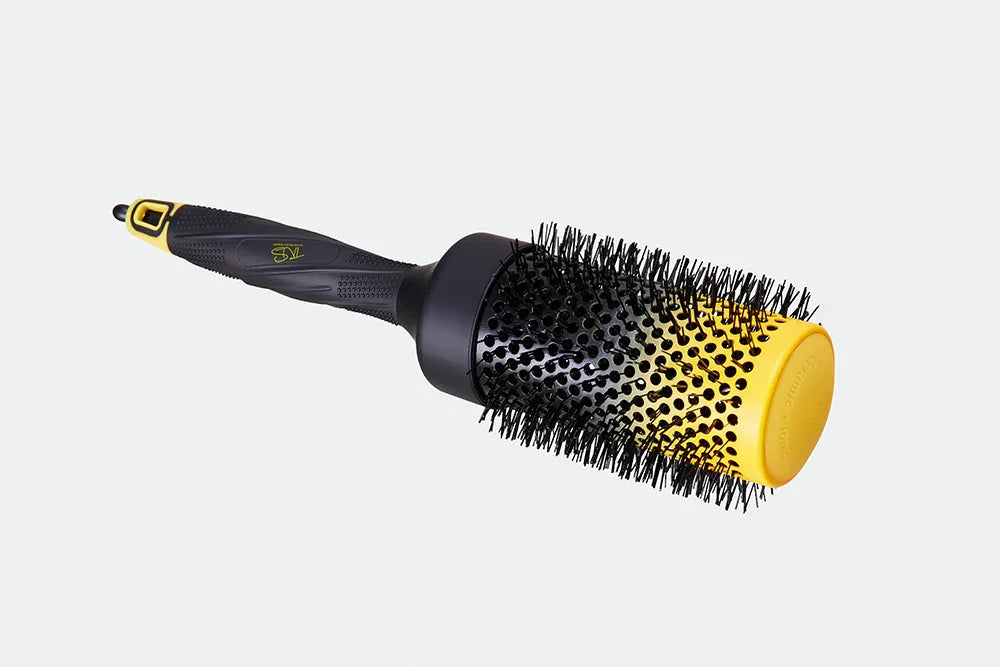 TNS Ionic Ceramic Round Brush lying flat, vented ceramic barrel