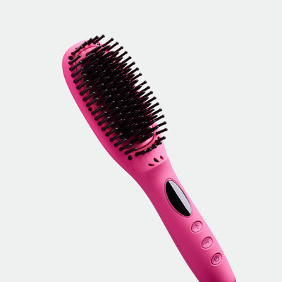 TNS Straightening Brush in Pink: angled close-up of the heated ionic ceramic bristles